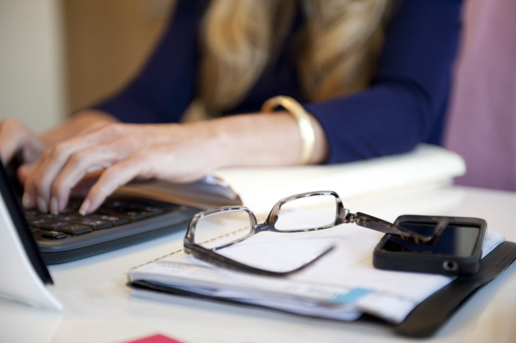 Woman at desk laptop